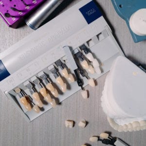 Dental shade guide with porcelain crowns